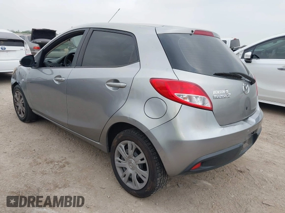 2013 Mazda 2 Sport z VIN JM1DE1KZ5D0164340, wystawiony jako IAAI lot #42280453 z przebiegiem 132 100 mil mil oraz . Historia ofert i sprzedaży dostępna na DreamBid. Obrazek 3.
