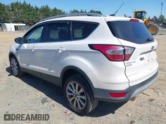 2017 Ford Escape Titanium with VIN 1FMCU9J96HUE21191, listed as a IAAI auction lot 42006013 with 71,786 mi miles. Bid and sale history available at carsss.com. Image 3.