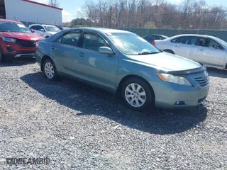 2009 Toyota Camry LE with VIN 4T1BK46K99U596777, listed as a IAAI auction lot 42007501 with 129,701 mi miles. Bid and sale history available at carsss.com. Image 1.
