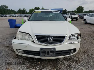 2004 Acura RL w/Navigation System z VIN JH4KA96674C007925, wystawiony jako Copart lot #56732645 z przebiegiem 188 312 mil mil oraz Szkoda całkowita • Salvage title. Historia ofert i sprzedaży dostępna na DreamBid. Obrazek 5.