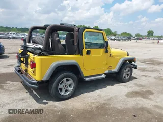 2004 Jeep Wrangler Sport z VIN 1J4FA49S04P701986, wystawiony jako IAAI lot #42256648 z przebiegiem 129 946 mil mil oraz . Historia ofert i sprzedaży dostępna na DreamBid. Obrazek 4.