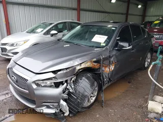 2015 Infiniti Q50 Premium z VIN JN1BV7ARXFM411040, wystawiony jako IAAI lot #41706295 z przebiegiem 97 297 mil mil oraz . Historia ofert i sprzedaży dostępna na DreamBid. Obrazek 6.