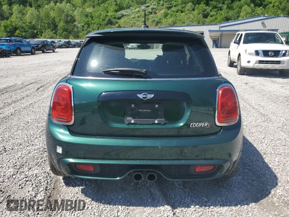 2014 MINI Hardtop S with VIN WMWXM7C50ET970033, listed as a Copart auction lot 56160735 with 125,208 mi miles and Salvage title. Bid and sale history available at DreamBid. Image 6.