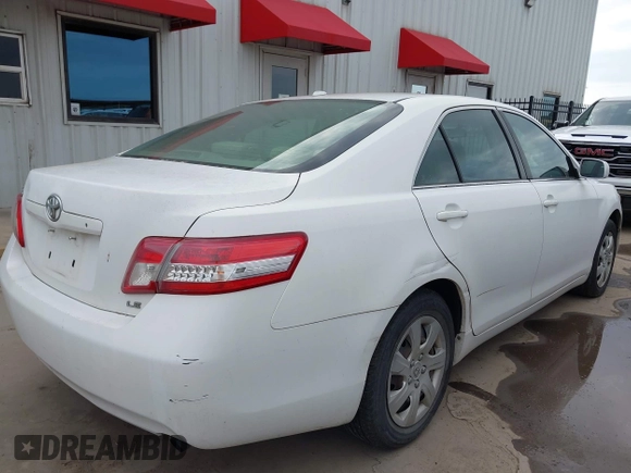 2010 Toyota Camry with VIN 4T1BF3EK9AU561936, listed as a IAAI auction lot 42188676 with 210,580 mi miles and . Bid and sale history available at DreamBid. Image 4.