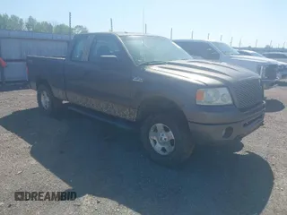 2007 Ford F-150 STX with VIN 1FTRX14W47FA54576, listed as a IAAI auction lot 41971521 with 220,945 mi miles. Bid and sale history available at carsss.com. Image 1.