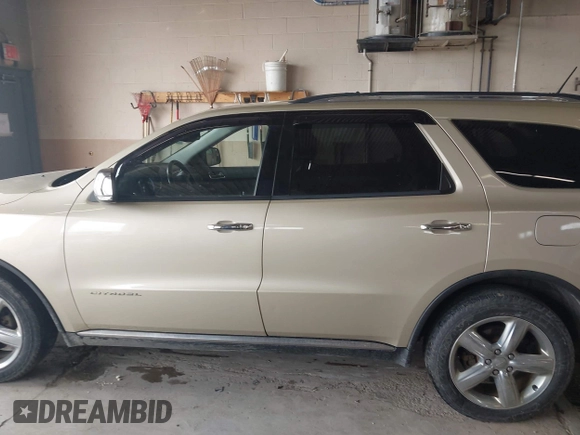 2011 Dodge Durango Citadel with VIN 1D4SE5GT3BC695795, listed as a IAAI auction lot 42105921 with 259,490 mi miles and . Bid and sale history available at DreamBid. Image 14.