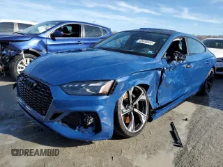 2023 Audi RS 5 Sportback z VIN WUAAWCF54PA903752, wystawiony jako Copart lot #40446644 z przebiegiem 9 820 mil mil oraz . Historia ofert i sprzedaży dostępna na DreamBid. Obrazek 1.