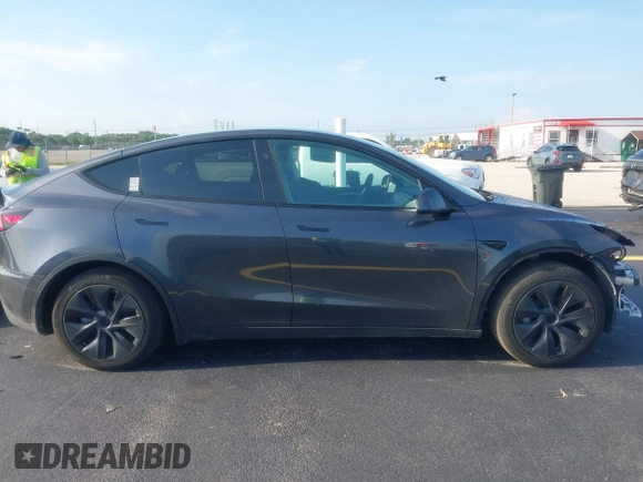 2024 Tesla Model Y with VIN 7SAYGDED3RA329355, listed as a IAAI auction lot 42343269 with 8,334 mi miles and . Bid and sale history available at DreamBid. Image 14.