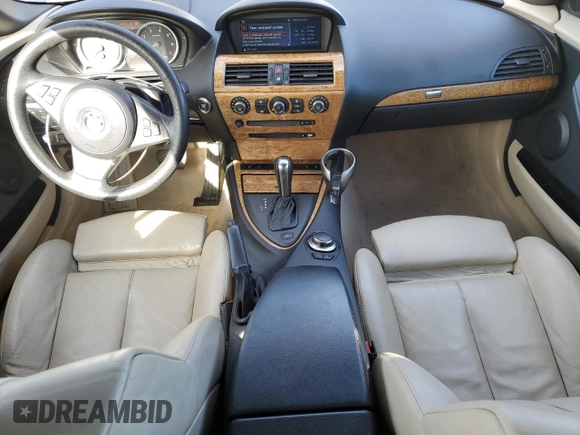 2006 BMW 6 Series 650Ci z VIN WBAEK13486CN78310, wystawiony jako Copart lot #88367535 z przebiegiem 97 566 mil mil oraz Szkody całkowita. Historia ofert i sprzedaży dostępna na DreamBid. Obrazek 8.