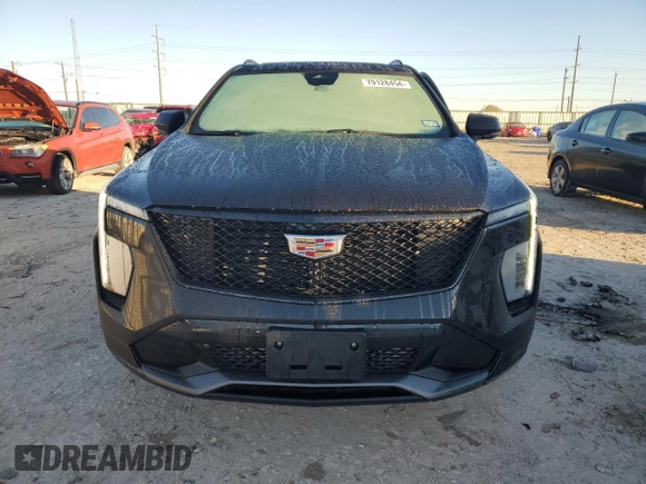 2024 Cadillac XT4 FWD Sport with VIN 1GYFZER47RF101186, listed as a Copart auction lot 79128454 with 10,499 mi miles and Salvage title. Bid and sale history available at DreamBid. Image 5.