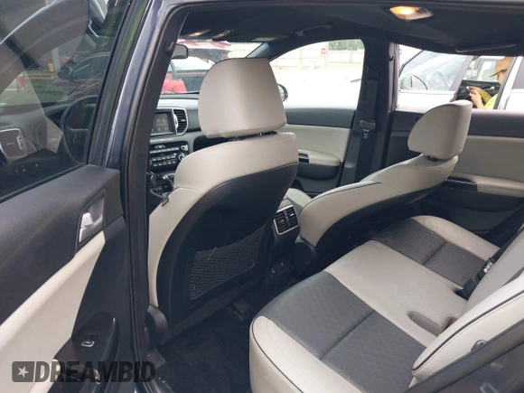 2019 Kia Sportage EX with VIN KNDPN3AC3K7569882, listed as a IAAI auction lot 42094311 with 67,816 mi miles and . Bid and sale history available at DreamBid. Image 8.