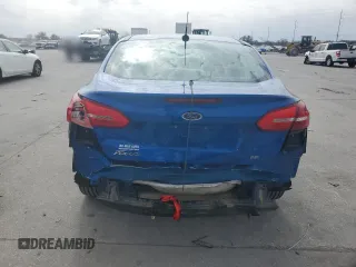 2018 Ford Focus SE z VIN 1FADP3F22JL328761, wystawiony jako Copart lot #45220705 z przebiegiem 71 639 mil mil oraz Szkoda całkowita • Salvage title. Historia ofert i sprzedaży dostępna na DreamBid. Obrazek 6.