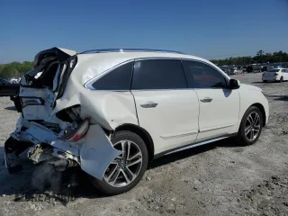 2017 Acura MDX Advance z VIN 5FRYD4H88HB010473, wystawiony jako Copart lot #52225265 z przebiegiem 80 307 mil mil oraz Szkoda całkowita • Salvage title. Historia ofert i sprzedaży dostępna na DreamBid. Obrazek 3.
