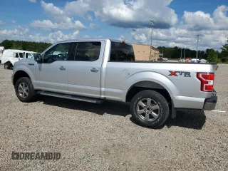 2018 Ford F-150 XL with VIN 1FTFW1EG3JFB90993, listed as a Copart auction lot 64446865 with 63,295 mi miles and Salvage title. Bid and sale history available at DreamBid. Image 2.