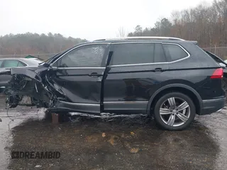 2021 Volkswagen Tiguan SE with VIN 3VV3B7AX3MM058751, listed as a IAAI auction lot 41527365 with 19,646 mi miles and . Bid and sale history available at DreamBid. Image 14.