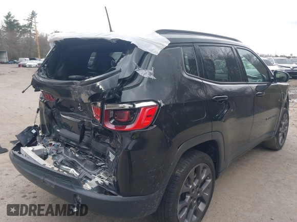 2021 Jeep Compass 80th Anniversary with VIN 3C4NJDEB1MT583160, listed as a IAAI auction lot 41855685 with 94,936 mi miles and . Bid and sale history available at DreamBid. Image 4.