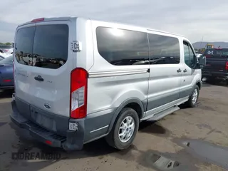 2015 Ford Transit XL z VIN 1FMZK1YMXFKA97523, wystawiony jako IAAI lot #40971108 z przebiegiem 253 712 mil mil oraz . Historia ofert i sprzedaży dostępna na DreamBid. Obrazek 4.