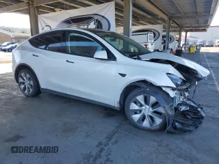 2024 Tesla Model Y Long Range с VIN 7SAYGDEE0RF981488, выставлен на аукционе Copart как лот 58704135 с пробегом 21 417 миль миль и Списание • Salvage title. История ставок и продаж доступна на DreamBid. Изображение 4.