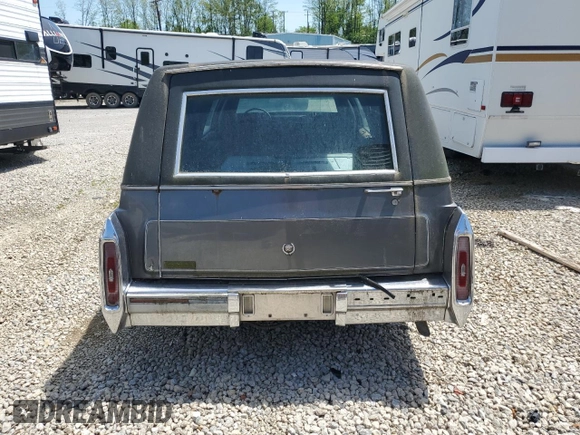 1991 Cadillac Brougham z VIN 1G6DW54E6MR718286, wystawiony jako Copart lot #54732145 z przebiegiem Nie podano mil oraz Tytuł czysty. Historia ofert i sprzedaży dostępna na DreamBid. Obrazek 6.