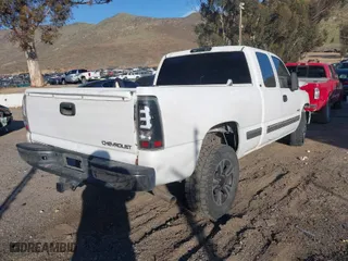 1999 Chevrolet Silverado 1500 LS with VIN 1GCEK19T9XE234489, listed as a IAAI auction lot 41614236 with 209,609 mi miles. Bid and sale history available at carsss.com. Image 4.