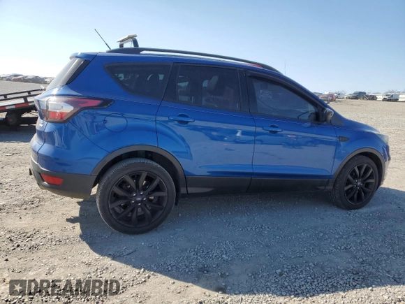 2017 Ford Escape SE with VIN 1FMCU0G96HUB59479, listed as a Copart auction lot 48711935 with 94,404 mi miles and Clean Title. Bid and sale history available at DreamBid. Image 3.