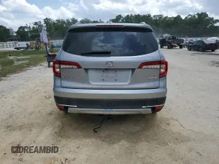 2021 Honda Pilot Touring 8-Passenger with VIN 5FNYF6H90MB079698, listed as a Copart auction lot 52011005 with 90,331 mi miles and Non repairable. Bid and sale history available at DreamBid. Image 6.