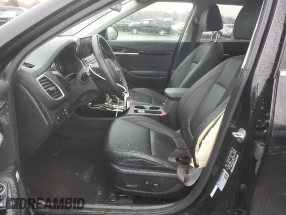 2021 Kia Seltos SX with VIN KNDETCA29M7217543, listed as a Copart auction lot 82009644 with 56,270 mi miles and Salvage Title. Bid and sale history available at carsss.com. Image 7.