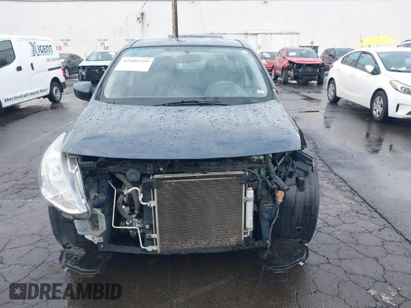 2015 Nissan Versa SV with VIN 3N1CN7APXFL957933, listed as a IAAI auction lot 41601299 with 54,799 mi miles. Bid and sale history available at carsss.com. Image 13.