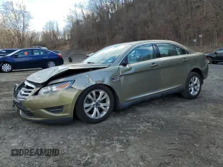 2012 Ford Taurus SEL z VIN 1FAHP2EW9CG100221, wystawiony jako Copart lot #52232225 z przebiegiem 63 548 mil mil oraz Szkoda całkowita • Salvage title. Historia ofert i sprzedaży dostępna na DreamBid. Obrazek 1.