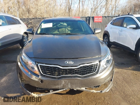 2015 Kia Optima LX with VIN 5XXGM4A71FG401974, listed as a IAAI auction lot 41781582 with 168,482 mi miles and . Bid and sale history available at DreamBid. Image 12.