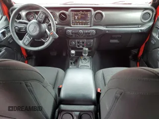 2023 Jeep Gladiator Sport S with VIN 1C6HJTAG4PL547608, listed as a Copart auction lot 52566245 with 8,464 mi miles and Salvage title. Bid and sale history available at DreamBid. Image 8.