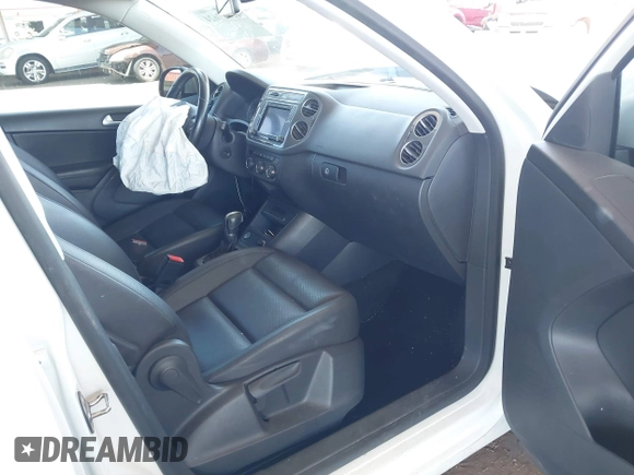 2017 Volkswagen Tiguan S with VIN WVGAV7AXXHK026143, listed as a IAAI auction lot 42257624 with 87,327 mi miles and . Bid and sale history available at DreamBid. Image 5.