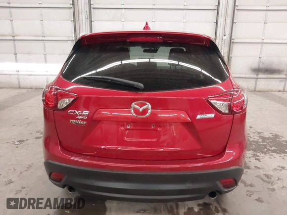 2016 Mazda CX-5 Grand Touring with VIN JM3KE4DY7G0731057, listed as a IAAI auction lot 41118072 with 134,107 mi miles and . Bid and sale history available at carsss.com. Image 17.