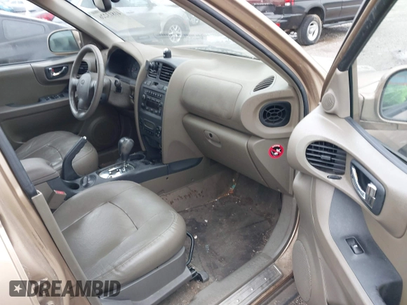 2004 Hyundai Santa Fe GLS with VIN KM8SC13E74U685895, listed as a IAAI auction lot 41813226 with 195,217 mi miles. Bid and sale history available at carsss.com. Image 5.