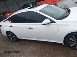 2019 Nissan Altima SV with VIN 1N4BL4DVXKC214904, listed as a IAAI auction lot 42162093 with 294,733 mi miles and . Bid and sale history available at DreamBid. Image 14.