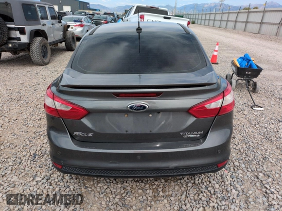 2013 Ford Focus SE with VIN 1FADP3F24DL189897, listed as a Copart auction lot 61970155 with 212,218 mi miles and Salvage title. Bid and sale history available at DreamBid. Image 6.