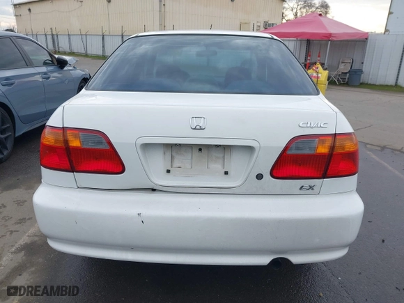 1999 Honda Civic EX with VIN 2HGEJ8648XH526377, listed as a IAAI auction lot 41517330 with 167,375 mi miles. Bid and sale history available at carsss.com. Image 16.