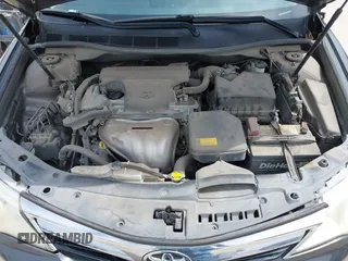 2014 Toyota Camry L with VIN 4T4BF1FKXER379158, listed as a IAAI auction lot 42050926 with 88,060 mi miles and . Bid and sale history available at DreamBid. Image 10.
