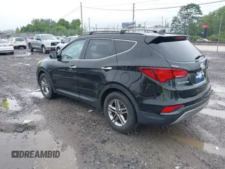 2017 Hyundai Santa Fe 2.4L z VIN 5NMZU3LB3HH011127, wystawiony jako IAAI lot #42369671 z przebiegiem 91 634 mil mil oraz . Historia ofert i sprzedaży dostępna na DreamBid. Obrazek 3.
