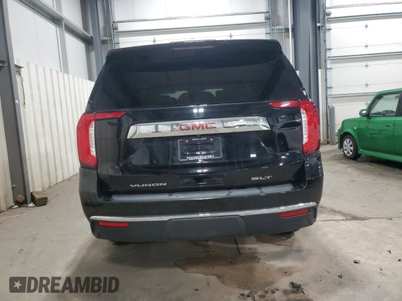 2021 GMC Yukon XL SLT with VIN 1GKS2GKDXMR371393, listed as a Copart auction lot 85052824 with 104,432 mi miles and Salvage Title. Bid and sale history available at carsss.com. Image 6.
