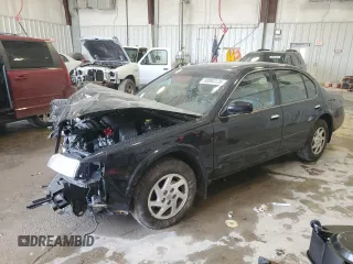 1999 Nissan Maxima GXE z VIN JN1CA21A7XT707802, wystawiony jako Copart lot #50064125 z przebiegiem 110 168 mil mil oraz Nie do naprawy • Non repairable. Historia ofert i sprzedaży dostępna na DreamBid. Obrazek 1.