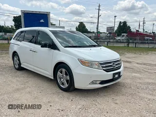 2011 Honda Odyssey Touring с VIN 5FNRL5H92BB008426, выставлен на аукционе Copart как лот 59419585 с пробегом 245 087 миль миль и Чистый • Clean title. История ставок и продаж доступна на DreamBid. Изображение 1.