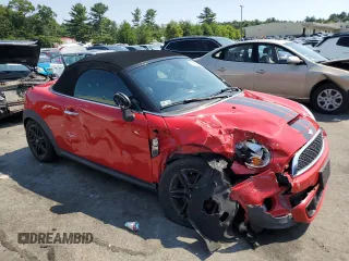 2013 MINI Roadster S z VIN WMWSY3C58DT594039, wystawiony jako Copart lot #65833804 z przebiegiem Nie podano mil oraz Szkody całkowita. Historia ofert i sprzedaży dostępna na DreamBid. Obrazek 4.