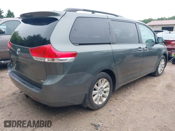 2014 Toyota Sienna Limited with VIN 5TDDK3DC5ES083785, listed as a IAAI auction lot 42559682 with 168,244 mi miles and . Bid and sale history available at DreamBid. Image 4.