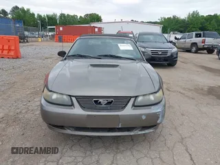 2001 Ford Mustang Deluxe z VIN 1FAFP44411F159656, wystawiony jako IAAI lot #42123128 z przebiegiem 191 814 mil mil oraz . Historia ofert i sprzedaży dostępna na DreamBid. Obrazek 13.
