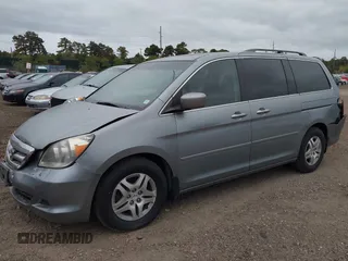 2005 Honda Odyssey EX-L with VIN 5FNRL38625B041067, listed as a IAAI auction lot 40519464 with 117,606 mi miles and . Bid and sale history available at carsss.com. Image 2.