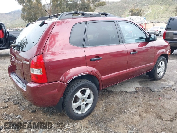 2006 Hyundai Tucson GL with VIN KM8JM12BX6U431424, listed as a IAAI auction lot 41769787 with 125,218 mi miles. Bid and sale history available at carsss.com. Image 4.