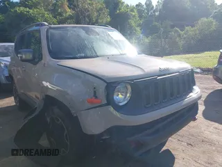 2015 Jeep Renegade Trailhawk z VIN ZACCJBCT3FPC40464, wystawiony jako IAAI lot #42319198 z przebiegiem 90 055 mil mil oraz . Historia ofert i sprzedaży dostępna na DreamBid. Obrazek 1.
