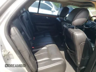 2009 Cadillac DTS 1SA z VIN 1G6KD57Y69U114700, wystawiony jako Copart lot #56007485 z przebiegiem 158 849 mil mil oraz Szkody całkowita. Historia ofert i sprzedaży dostępna na DreamBid. Obrazek 10.