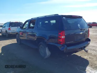 2009 Chevrolet Suburban LS z VIN 1GNFC16029R200974, wystawiony jako IAAI lot #41370873 z przebiegiem 207 649 mil mil oraz . Historia ofert i sprzedaży dostępna na DreamBid. Obrazek 3.